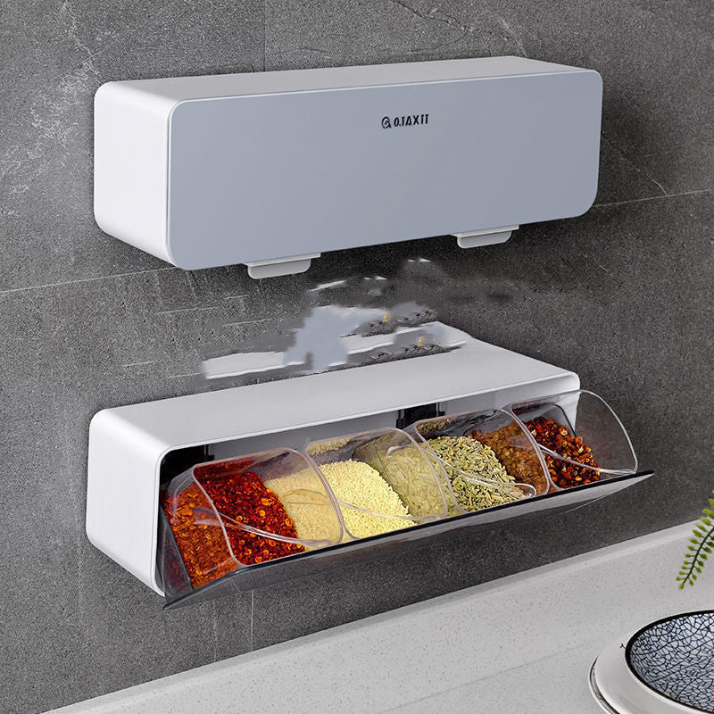 Caixa de especiarias de cozinha com colher 
Caixa de tempero de parede.