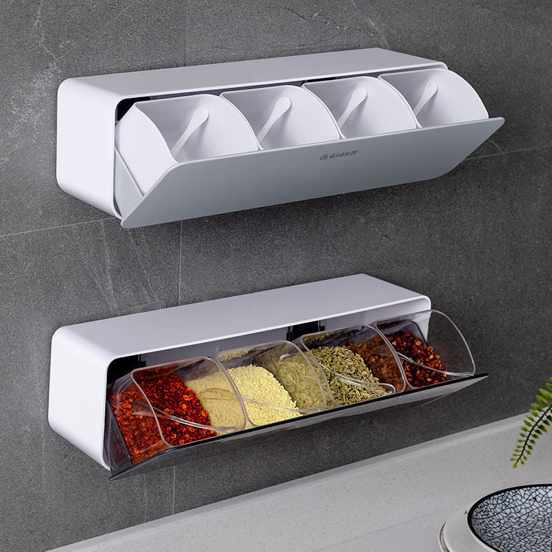 Caixa de especiarias de cozinha com colher 
Caixa de tempero de parede.